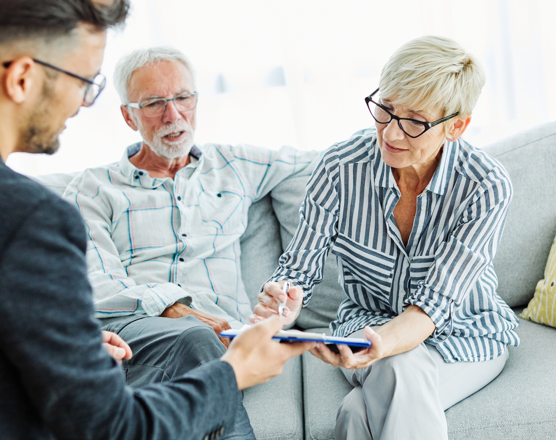 Retired couple meeting with financial advisor