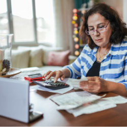 Older woman reviews finances to see if she should opt for an annuity alternative