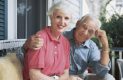 Retired couple relaxing on their porch