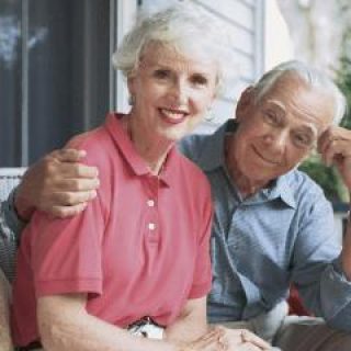 Retired couple relaxing on their porch