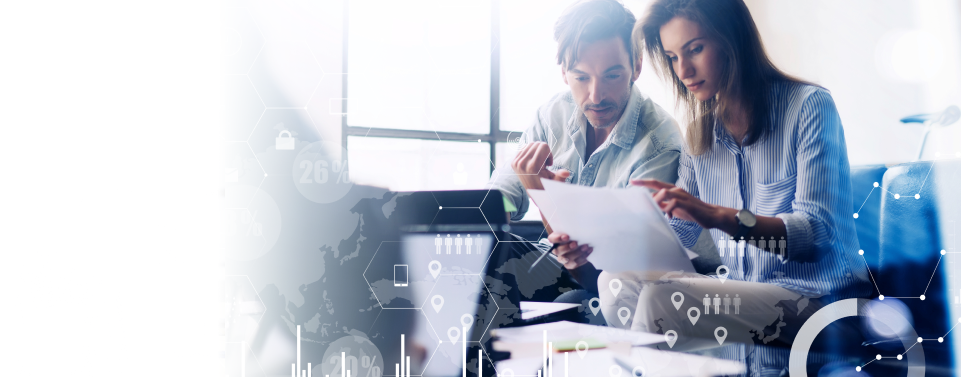 Photograph of a couple looking at their finances with an overlay of graphs and charts