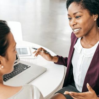 Woman meets with financial advisor